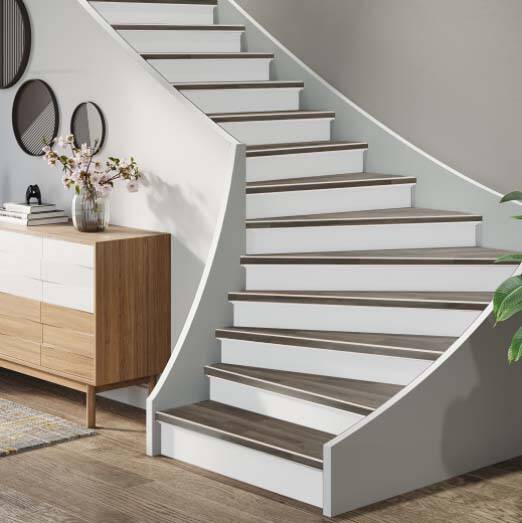 PVC stair renovation Spain – modern wood-look finish